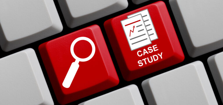 Image of a keyboard with a magnifying glass and text saying "case study"